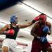 A2 Fight boxer Arkeem Kirk swings at Glenville-Rec fighter Boney Hines on Friday, July 19. Daniel Brenner I AnnArbor.com